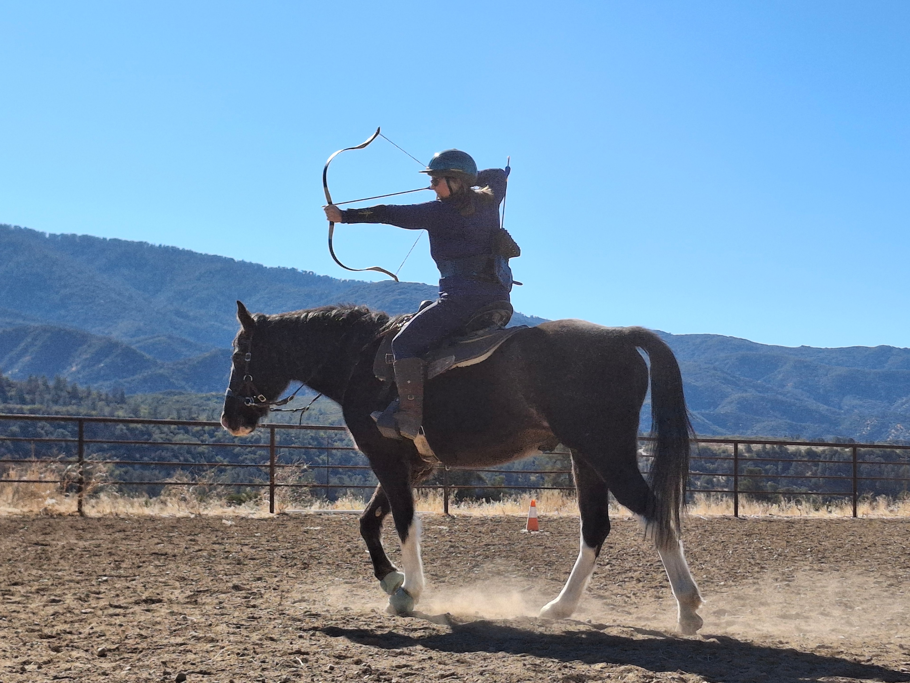 Archer on horseback at full draw